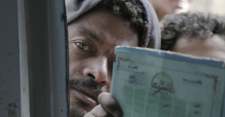 SANAA, YEMEN - MARCH 26: People wait in queues to benefit from the distributed meals amid the ongoing civil war between the Iranian-backed Houthis and government forces during the 9th year of civil war in Yemen.